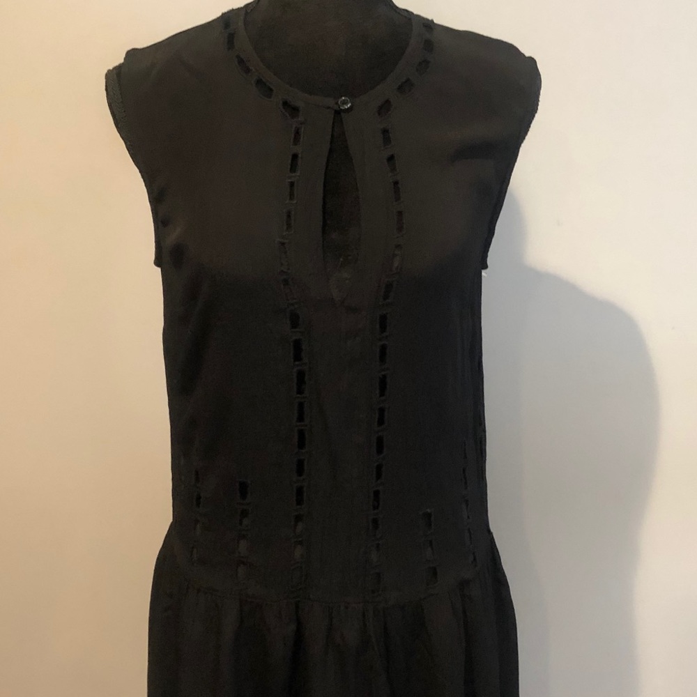 Black Viscose dress with cutouts.